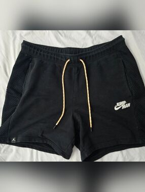 Jumpman Black Athletic Shorts with Yellow-Orange Drawstring